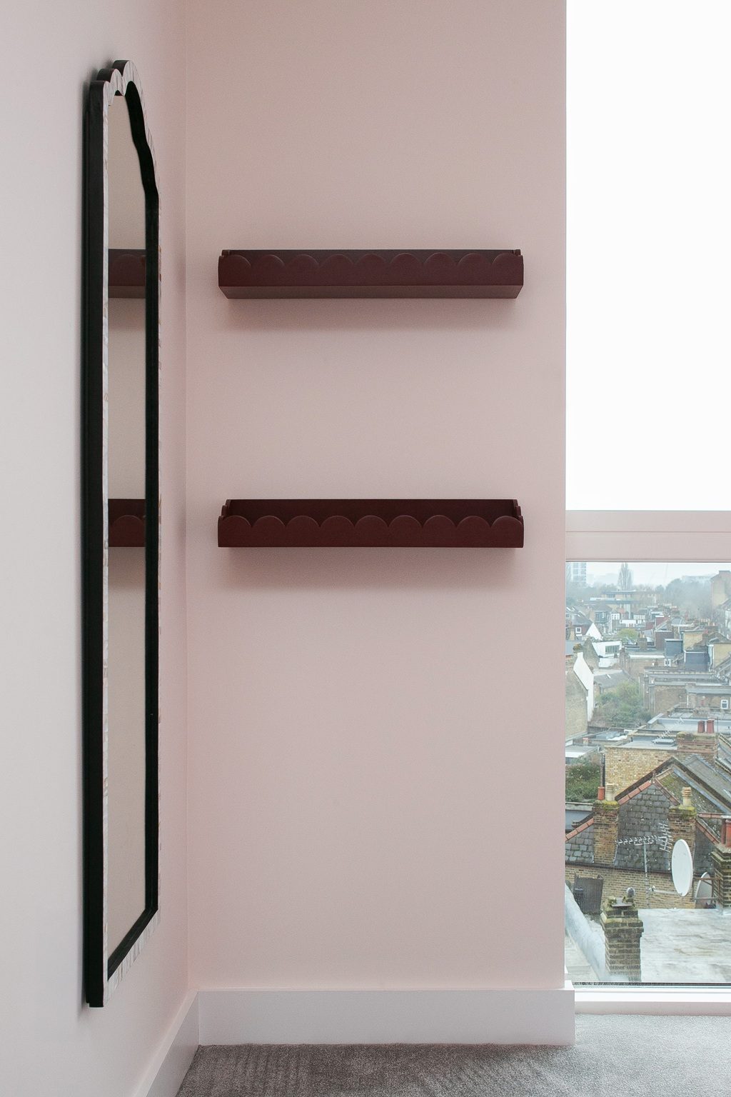 Carved Indian bench at the window